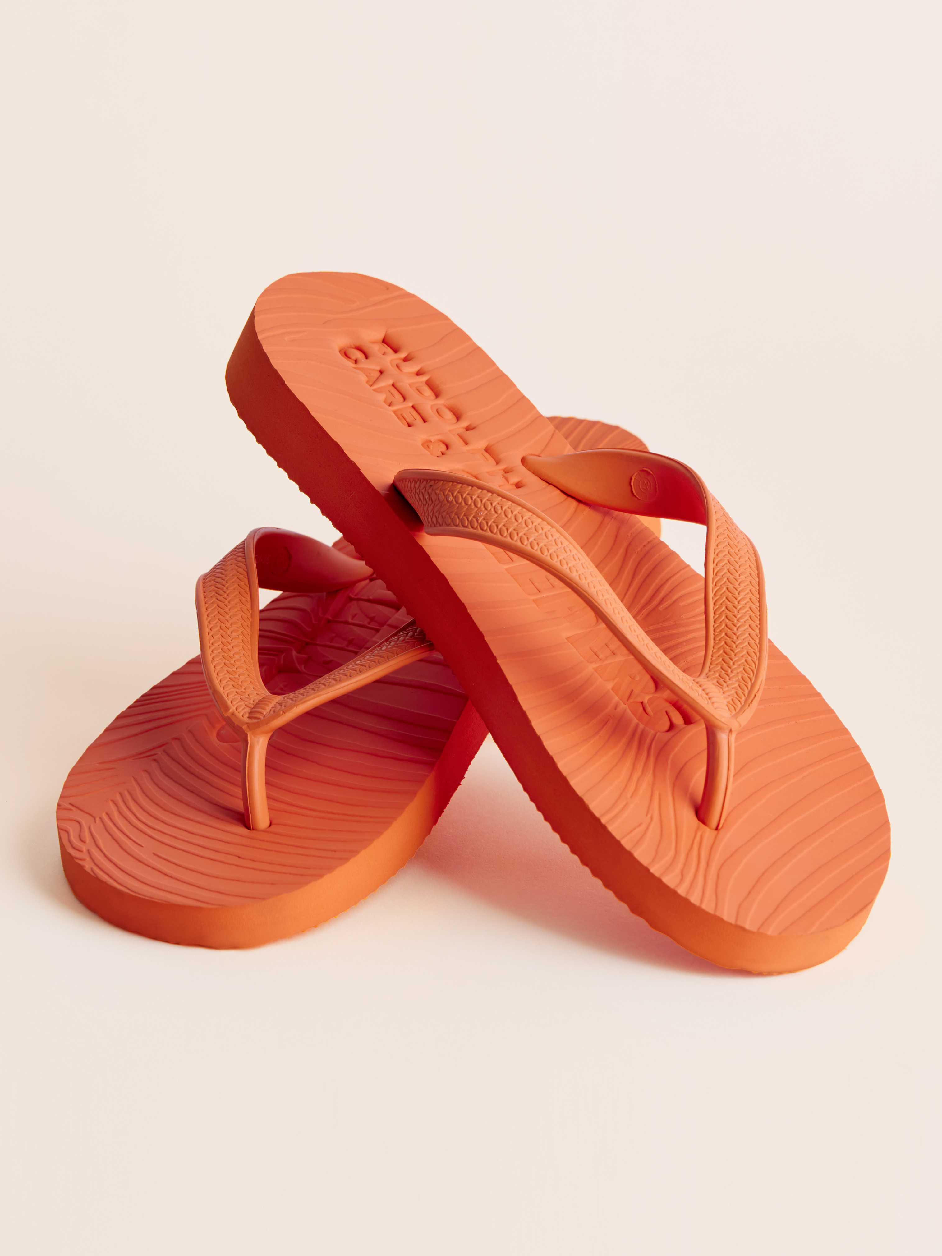 ladies orange flip flops